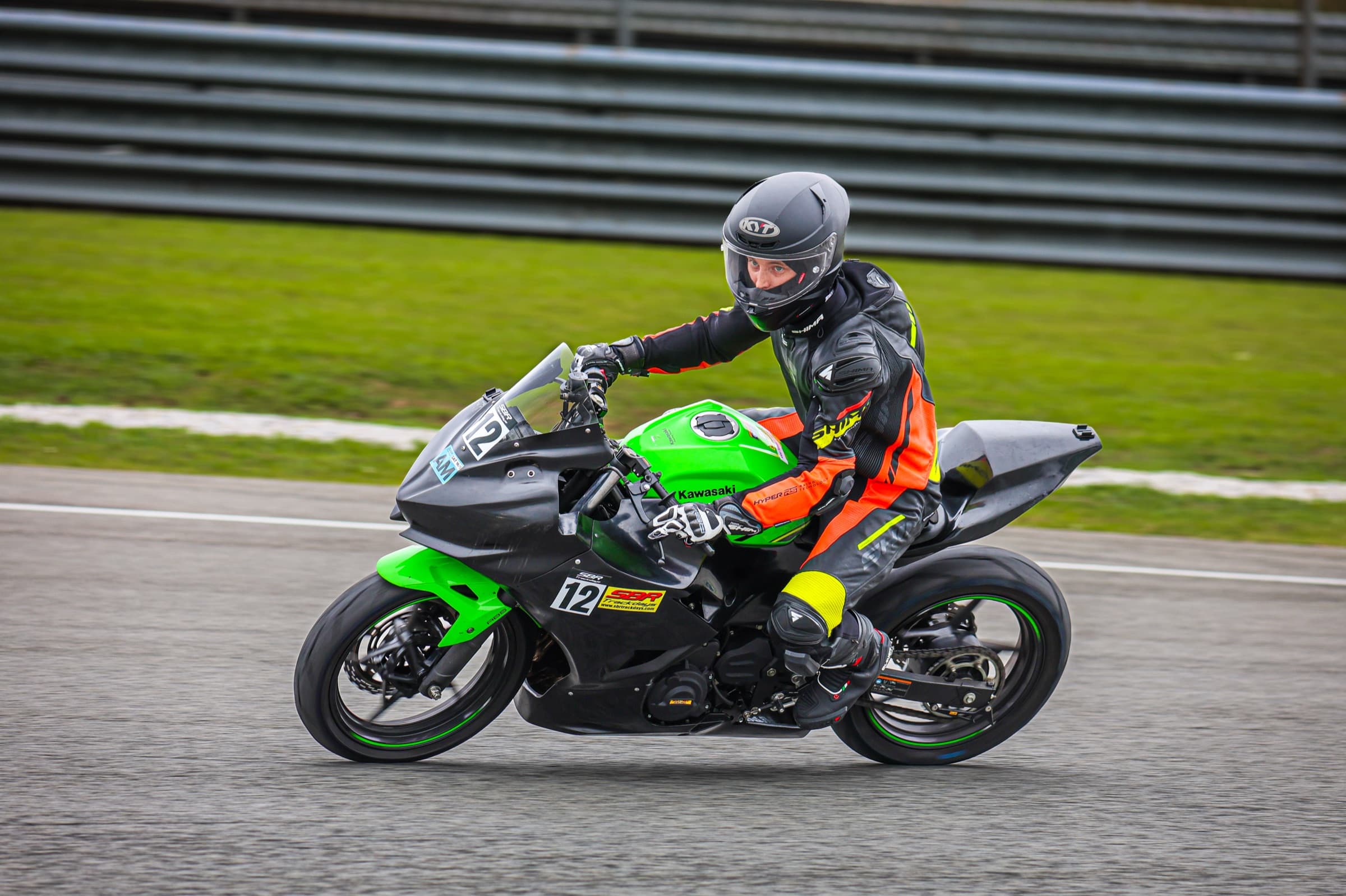 Rider hitting the apex on track