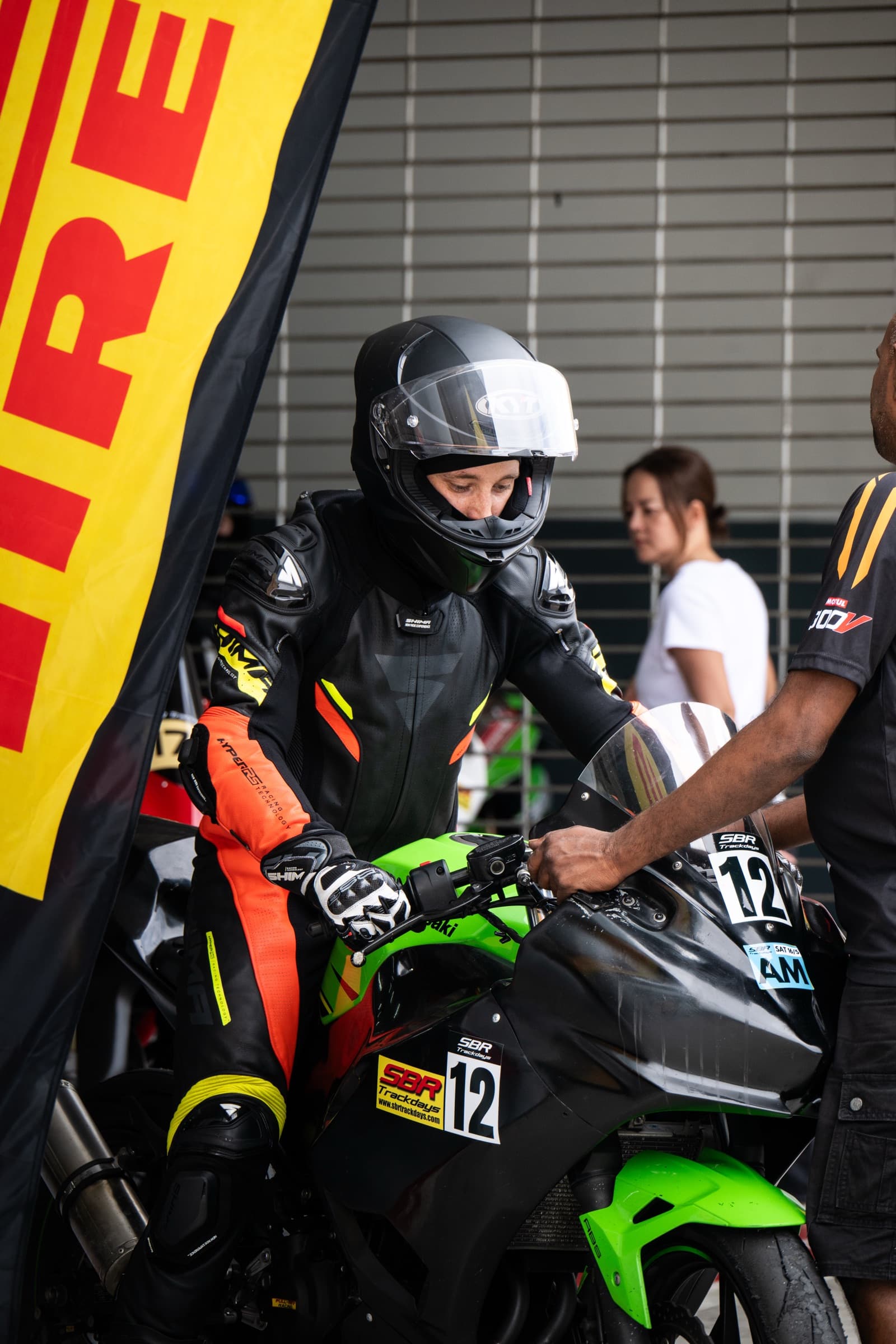 Rider gearing up trackside